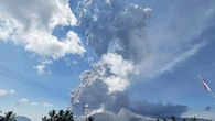 School holiday flights to Bali in chaos as deadly volcano erupts again