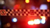 Woman killed in head-on collision with truck on Sydney road