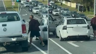 Shocking footage emerges of men brawling at intersection