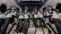 Astronauts splash down from space