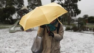 Australian cities wake to coldest day of the year as snow dusts alpine regions