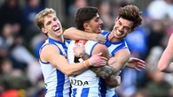 Knowing crowd erupts as history rewritten by Kangaroos star