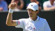 Alex de Minaur overcomes malfunctioning serve to progress at Wimbledon