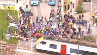 Police investigating race winner after train crossing chaos