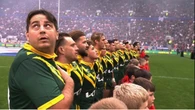 Notorious pitch invader stands with Aussies during national anthem