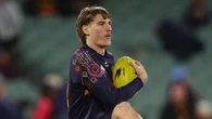 Adelaide Crows defender set to face court over car accident