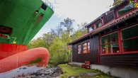 Man wakes up to find a giant cargo ship in his yard