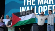 Festival apologises to band ‘cut off’ for waving Palestine flag