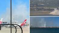 Qantas flight makes emergency landing as grass fire erupts near Sydney Airport runway