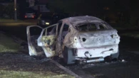 Wild scenes as shots fired at man tear into homes and car erupts in flames