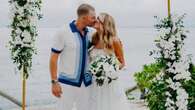 AFL coach and partner marry in tropical paradise