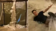 Terrifying moment waves smash through hotel doors amid deadly typhoon