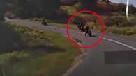 Heart-stopping moment motorcyclist careens into path of three oncoming riders