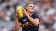 Grieving Crows captain Jordan Dawson back at training after week off