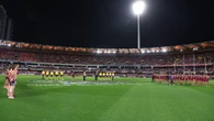 AFL fan charged after performing Nazi salute before semi-final