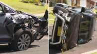 Father flees crash scene after pulling kids from flipped ute