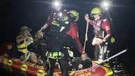 Farmers, working dogs saved in dramatic drone-assisted rescue