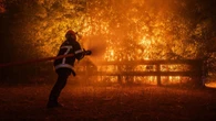 Raging wildfires force mass evacuations in France