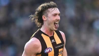 Hawks young gun cops it from teammates over $10m Essendon deal