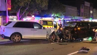 Rolls-Royce and Mercedes smash head-on in affluent suburb