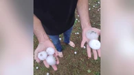 Giant hail batters communities in two states