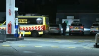 Man found dead inside luxury car at 7/11