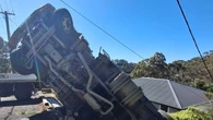 Moment truck tips over as job goes horribly wrong