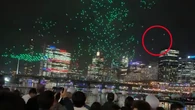 Dozens of drones plunge from the sky at Sydney light show