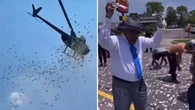 Dead man’s life savings thrown from helicopter