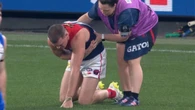 Ambulance called as concerns grow for injured defender