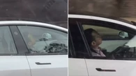 Tesla driver appears asleep behind wheel on busy motorway