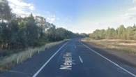 Elderly driver killed in collision between car towing caravan and truck