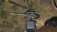 Man dead and teen critical as helicopter crashes onto car