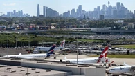 Flight forced back to gate after pair board under false names