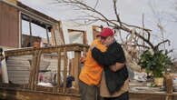 Monster storm kills 26, destroys homes, and sparks twisters across the US