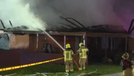Two narrowly escape late-night blaze that destroys two-storey home