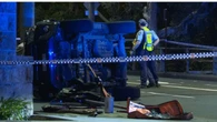 Driver trapped in car dies after crash into pole