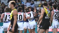 Roos move into wildcard spot after ugly win over Tigers