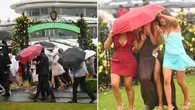 Racing fans brave the elements at rain-drenched Flemington