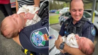 Baby Blake meets hero cops who helped him into the world