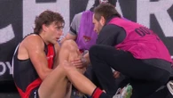 Horror scenes as Essendon forward suffers sickening leg injury