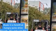 ‘Only in Australia’: Bizarre moment tradie drives A FORKLIFT through Hungry Jacks drive thru