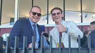 AFL president and TV star partner raise eyebrows with race-day photo