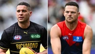 Police make move on AFL premiership duo in five-month backflip
