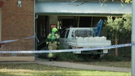 Driver allegedly drove at officers and crashed into station