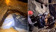 Hopes fade for two men trapped in Laos cave as search is suspended