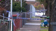 Murder charge laid as police hunt second suspect in deadly stabbing