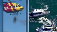 Dramatic rescue after boat capsize metres from shore leaves one dead