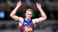 Star recruit kicks on as banged-up Lions thrash Collingwood