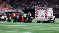 NFL game abandoned after player taken away in ambulance